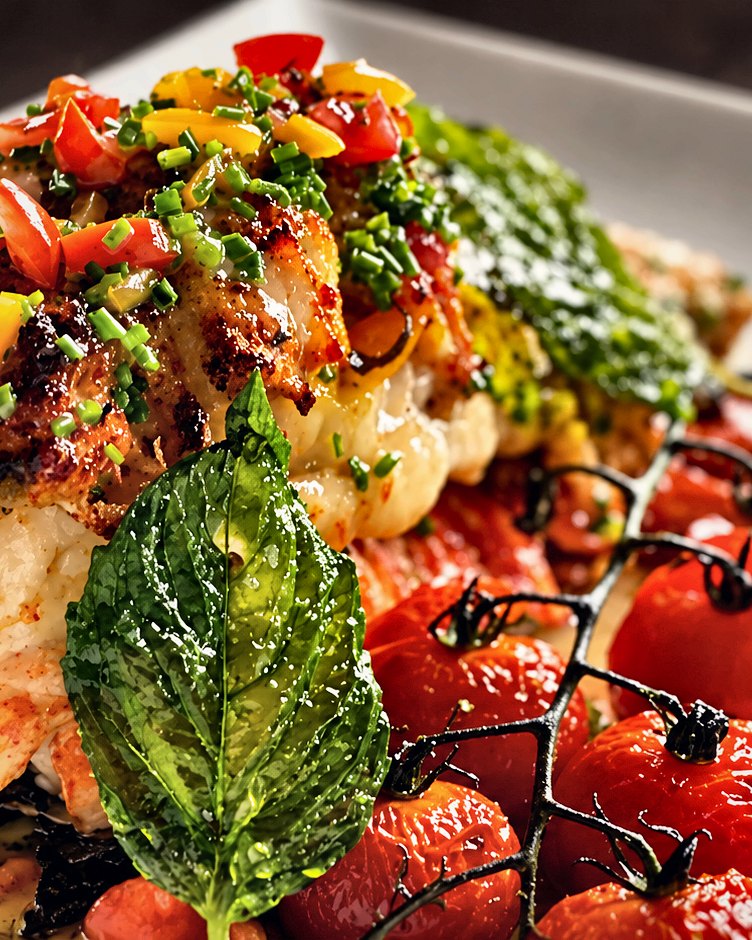 Lobster with charred sweet peppers and basil, plated by Chef Martin Fassi