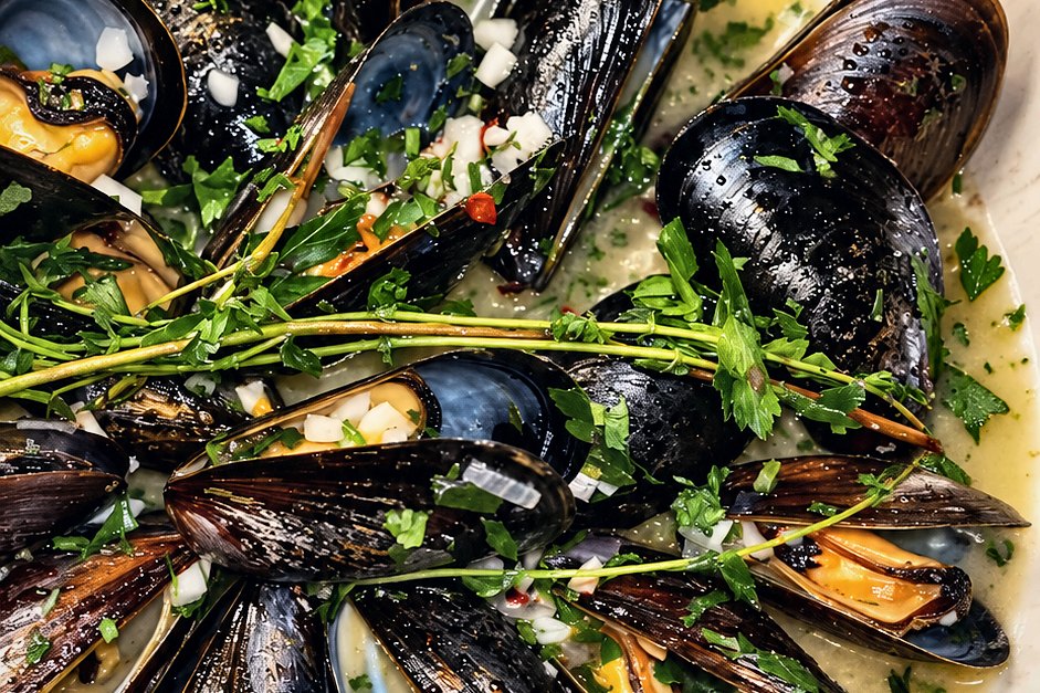 Mussels and seared fish in herb broth, cooked by Chef Fassi in Memorial